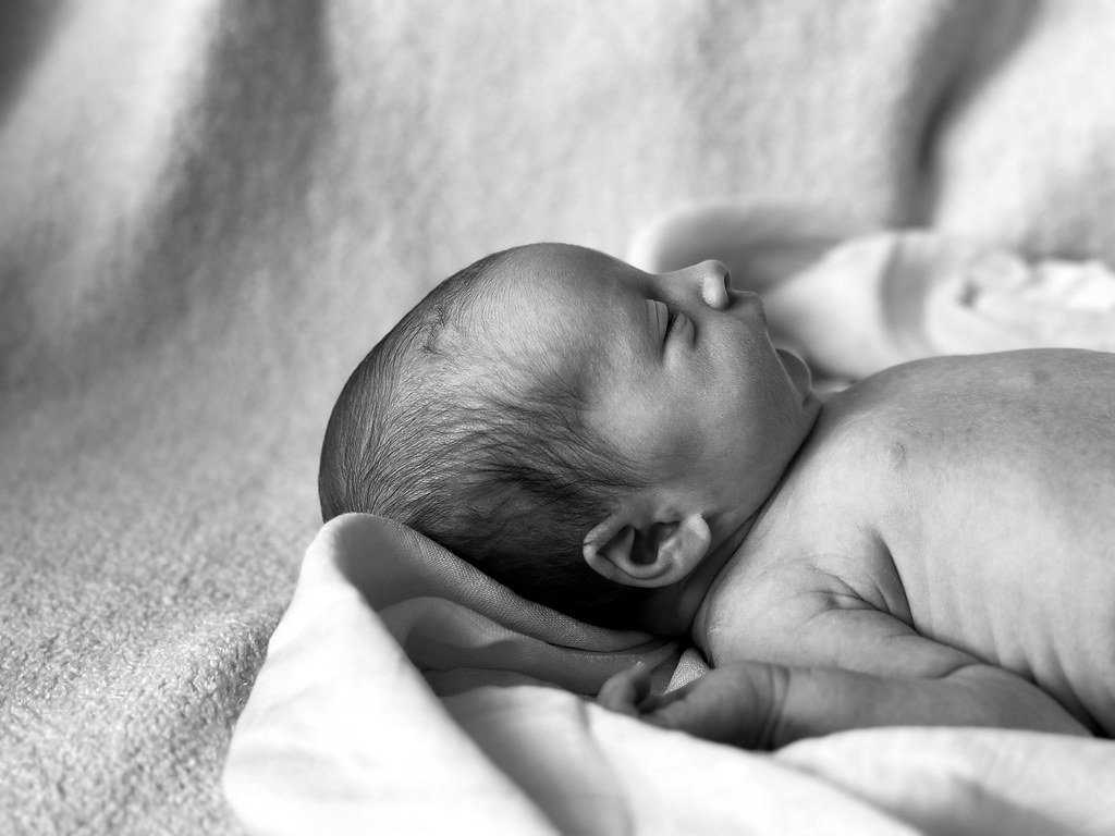 Gentle baby care and quiet support in a peaceful nursery setting
